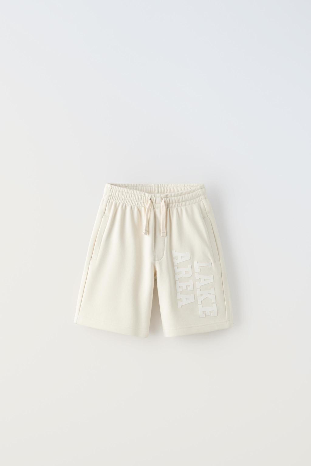 Short jogging texto relieve