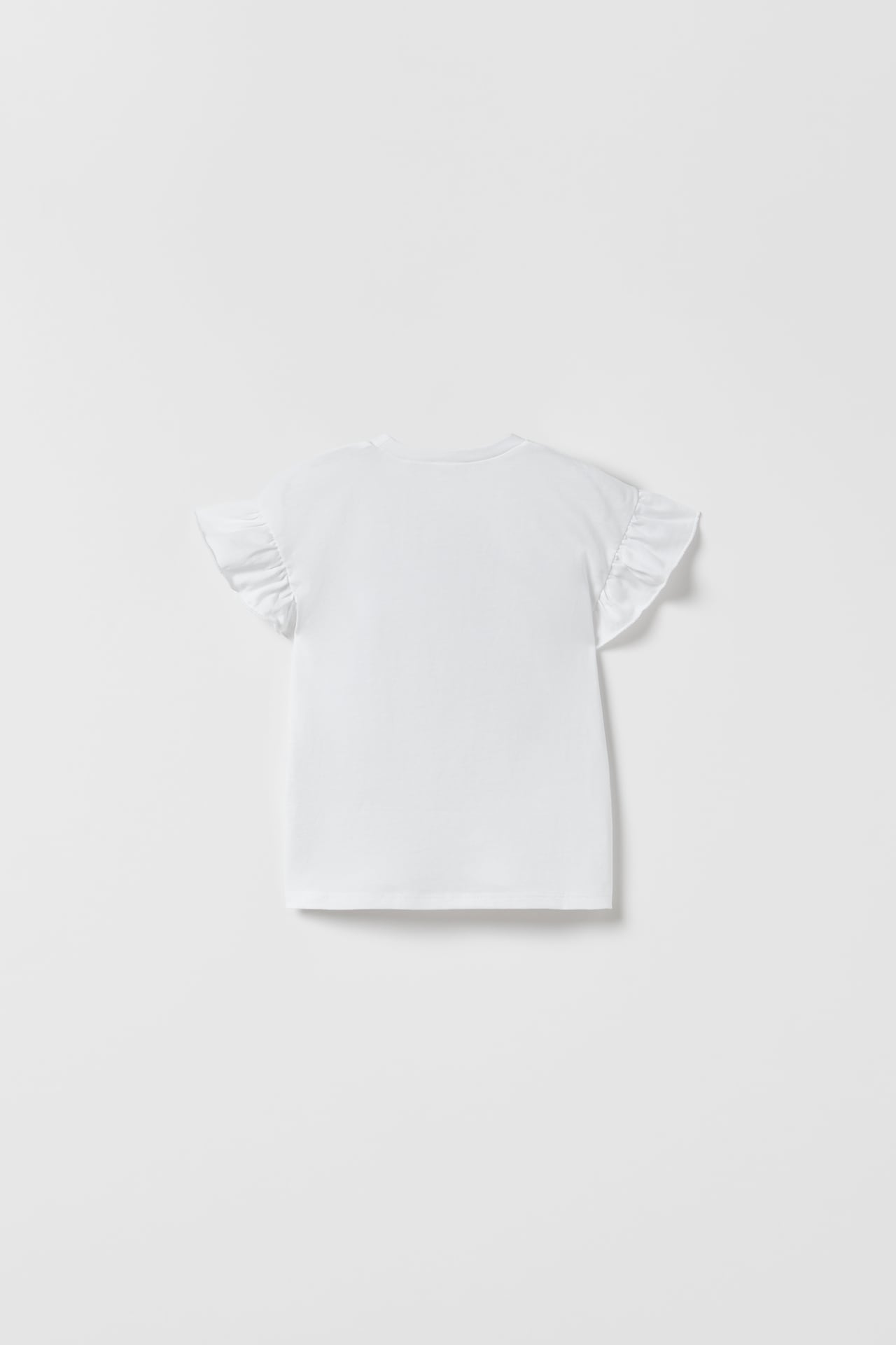 Polera volantes blanca